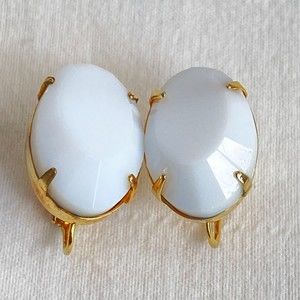 Vogue Jlry Earrings White Oval Facetted Stone On Gold Tone Prongs